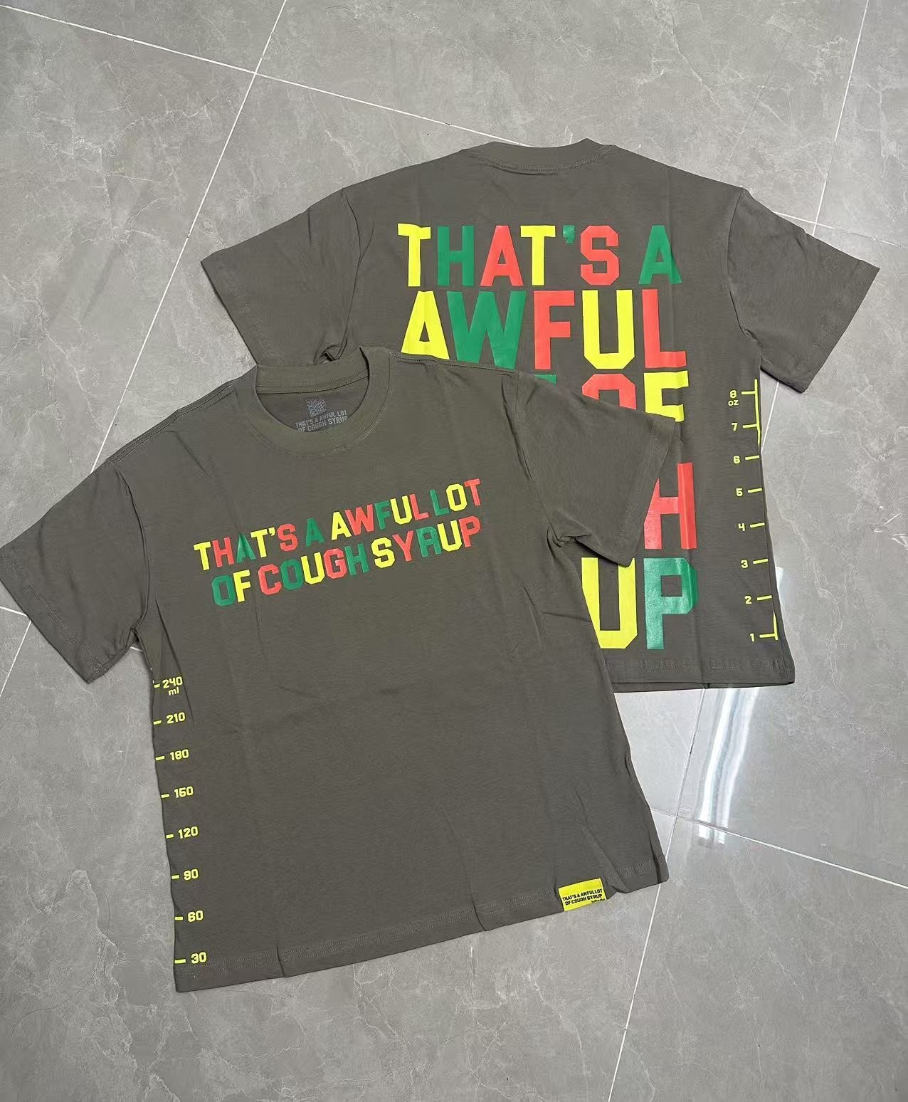 THAT'S A AWFUL LOT OF COUGH SYRUP Bottle Graphic T-Shirt — context