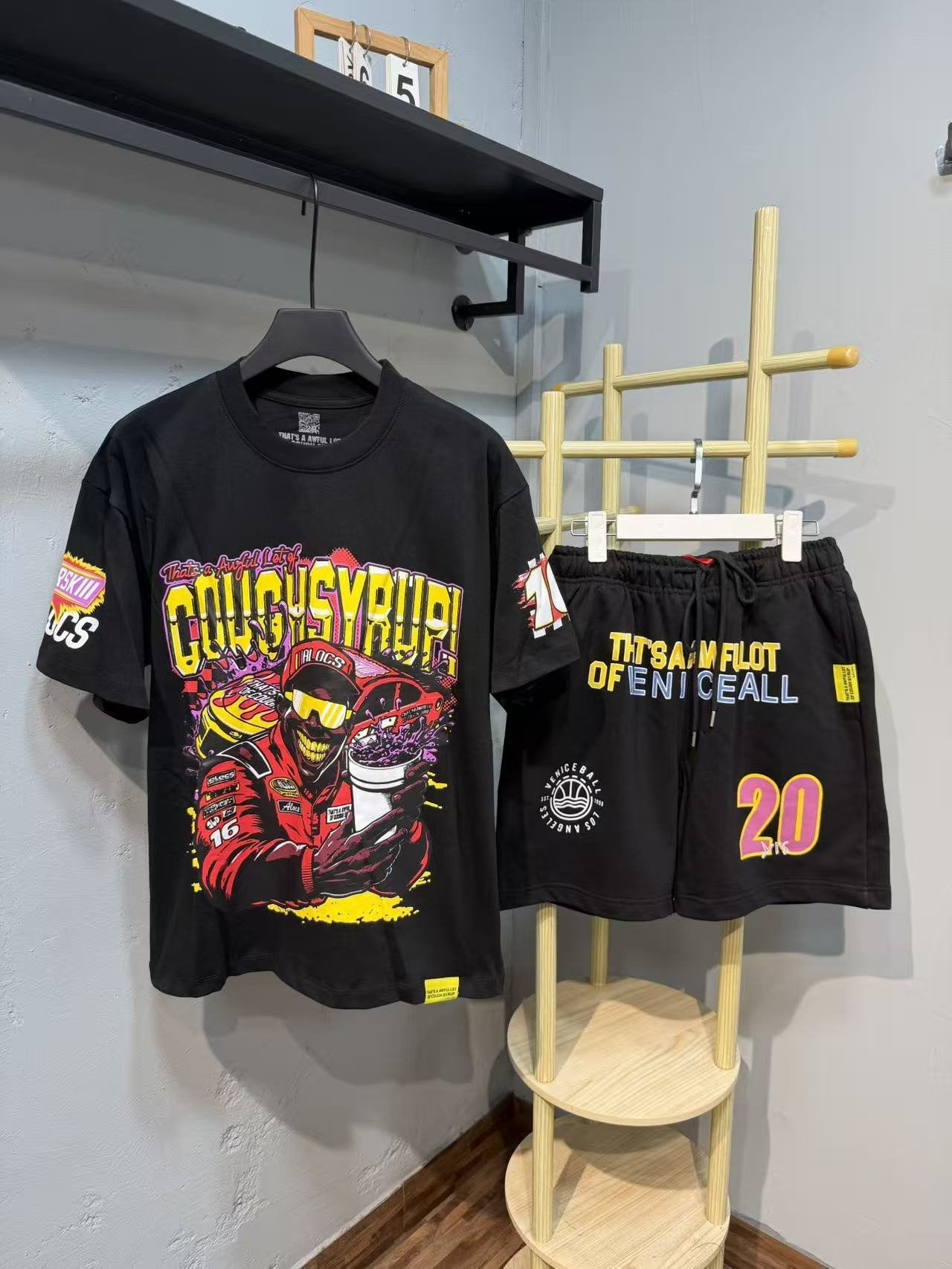 THAT'S A AWFUL LOT OF COUGH SYRUP Racing Graphic T-Shirt & Shorts Set — front