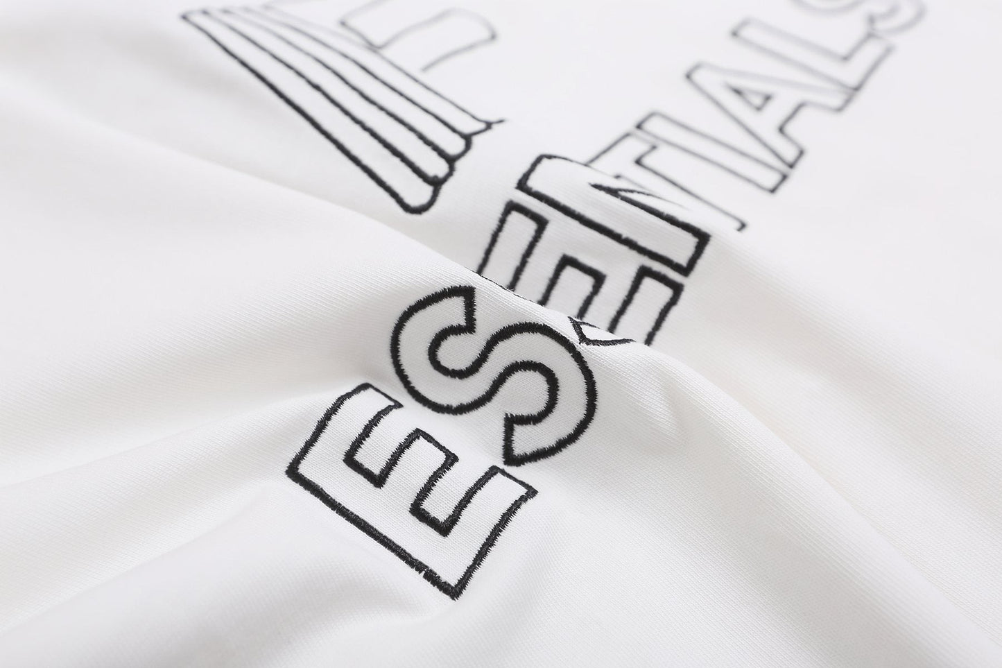 ESSENTIALS F-Letter Embroidered Graphic T-Shirt — fabric_closeup