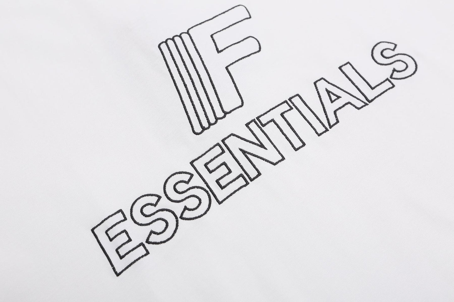 ESSENTIALS F-Letter Embroidered Graphic T-Shirt — fabric_closeup
