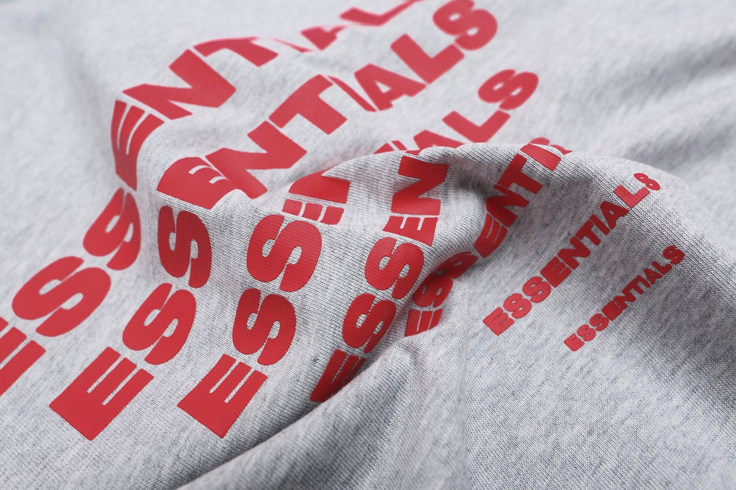 ESSENTIALS Repeated Graphic Short-Sleeve T-Shirt — detail