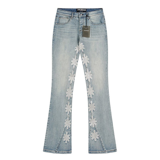 LOSTSHDWS Daisy Appliqué Flared Jeans — hero