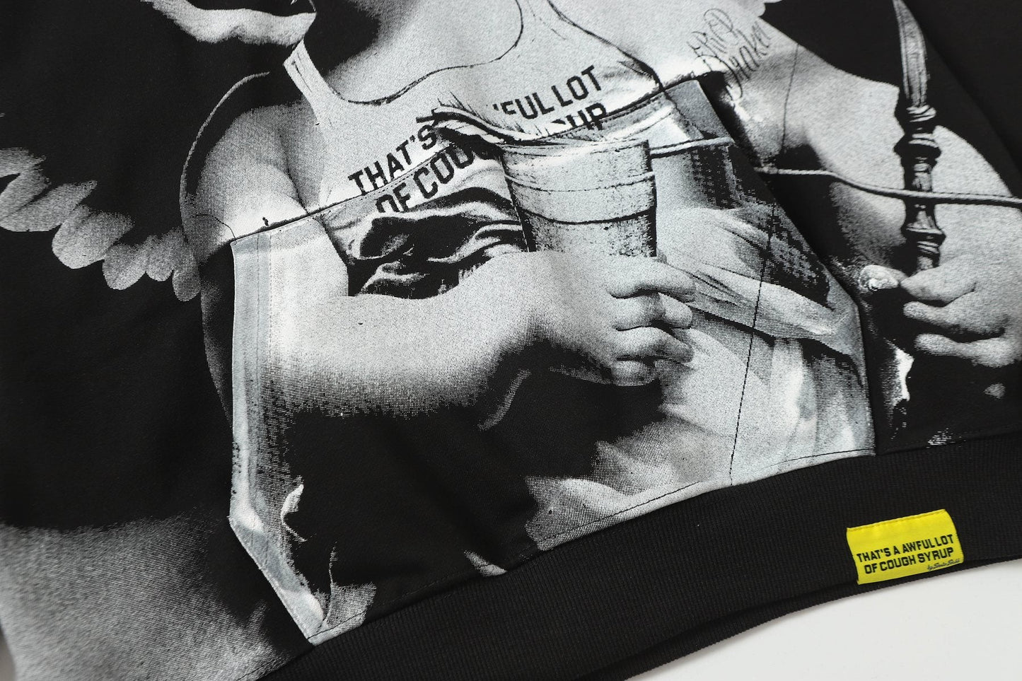 THAT'S A AWFUL LOT OF COUGH SYRUP Angel Tears Graphic Hoodie — detail