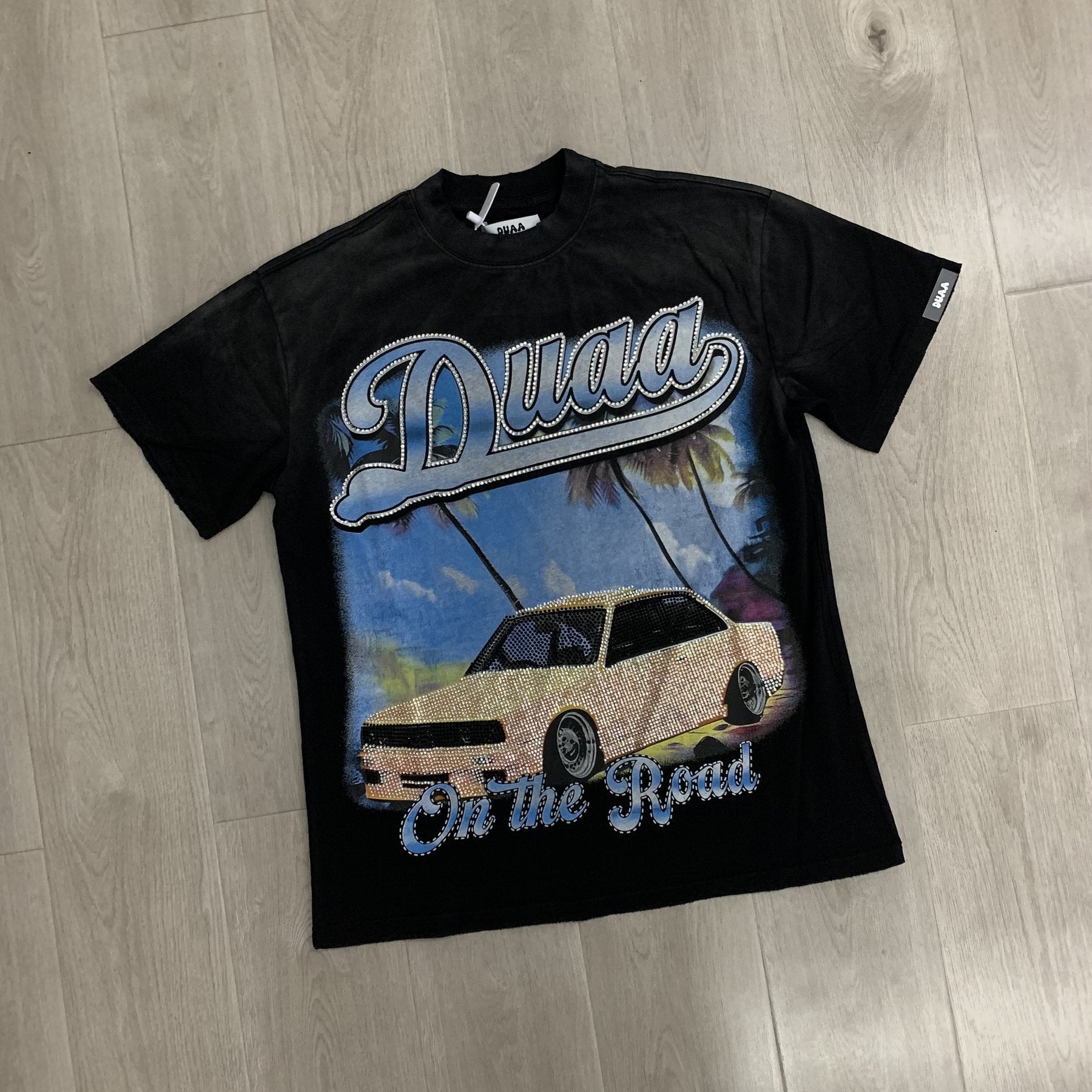 Rough Play Duaa Destination Car Graphic T-Shirt — front
