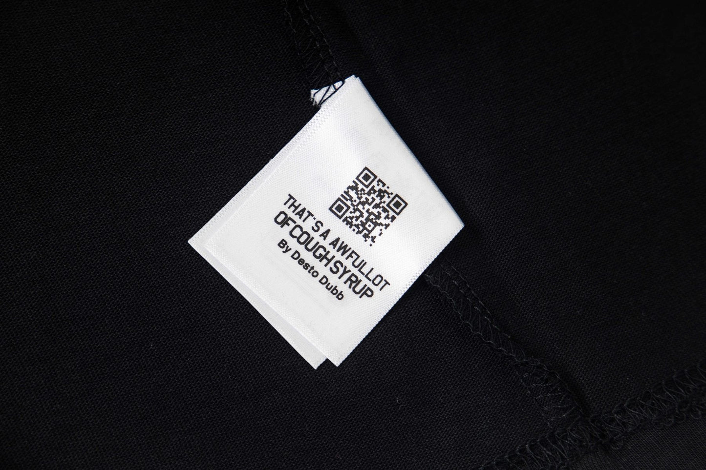 THAT'S A AWFUL LOT OF COUGH SYRUP Red/White Graphic Short-Sleeve T-Shirt — neck_label