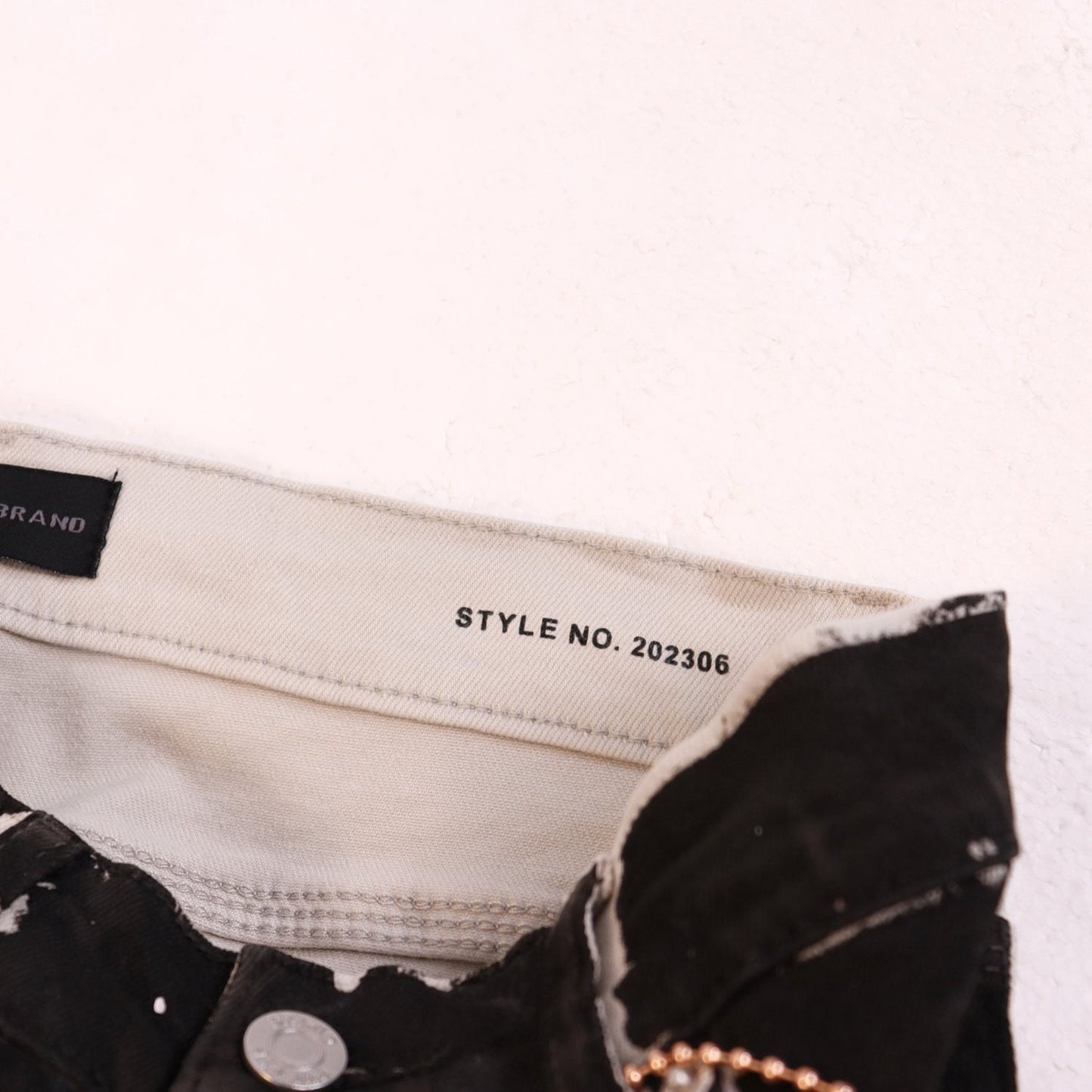 Purple Brand Distressed Graphic Jeans — neck_label