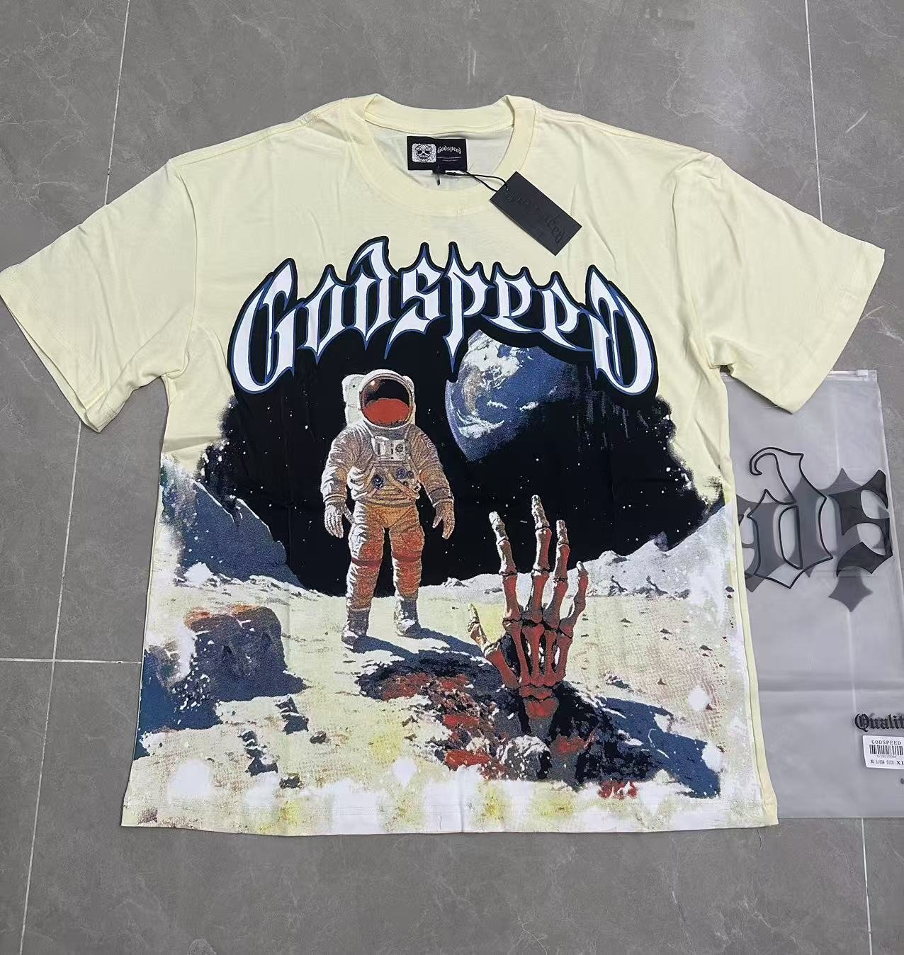 Godspeed Cream Astronaut Graphic Short-Sleeve T-Shirt — context