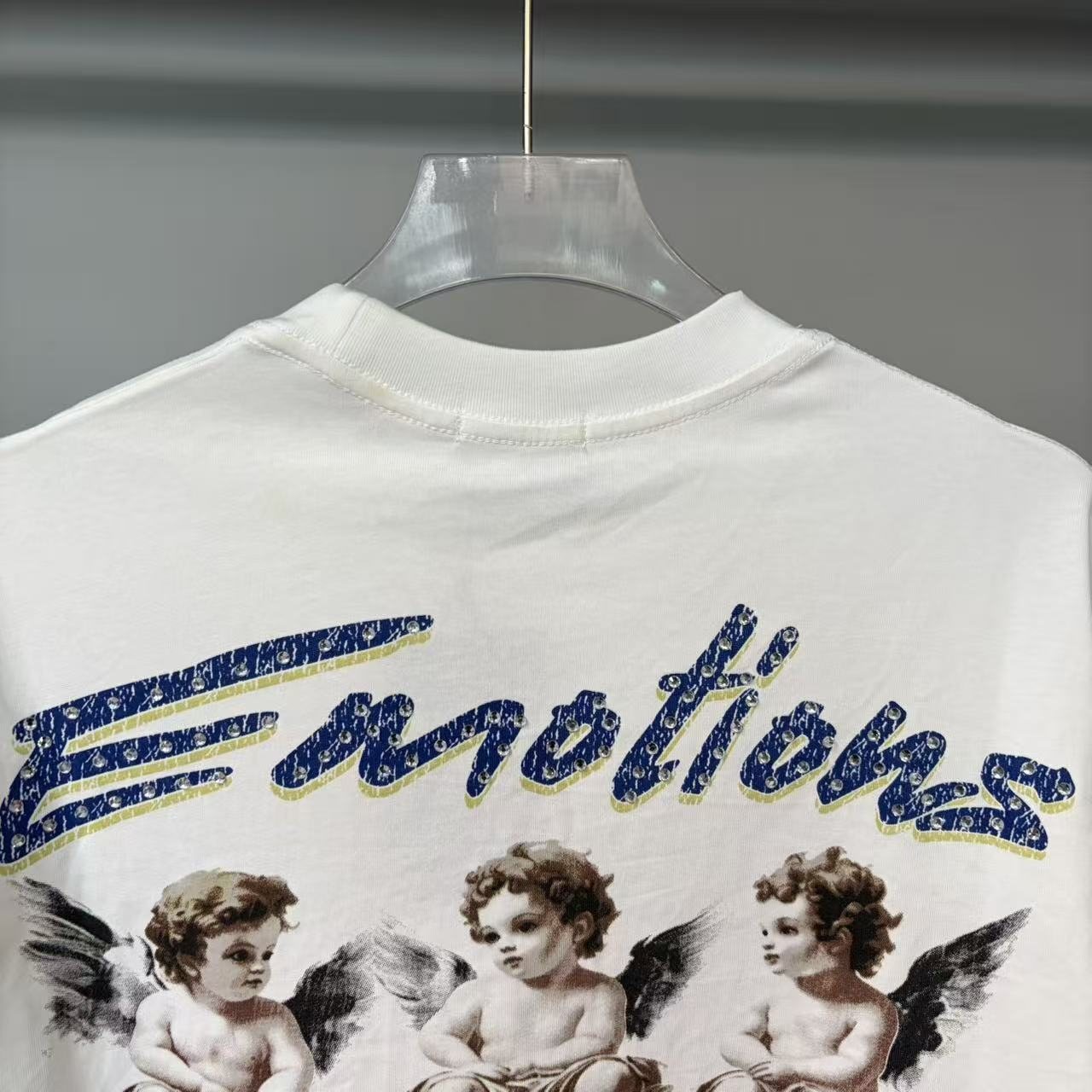 MIXED EMOTION Emotions Never Die Cherub Graphic T-Shirt — detail