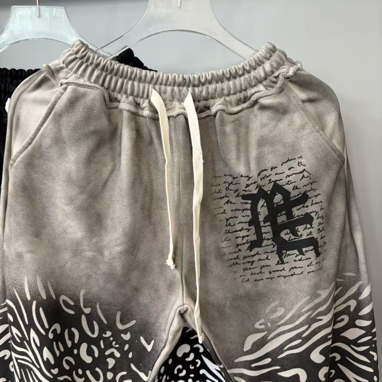 MIXED EMOTION Abstract Face Print Wide-Leg Pants — detail