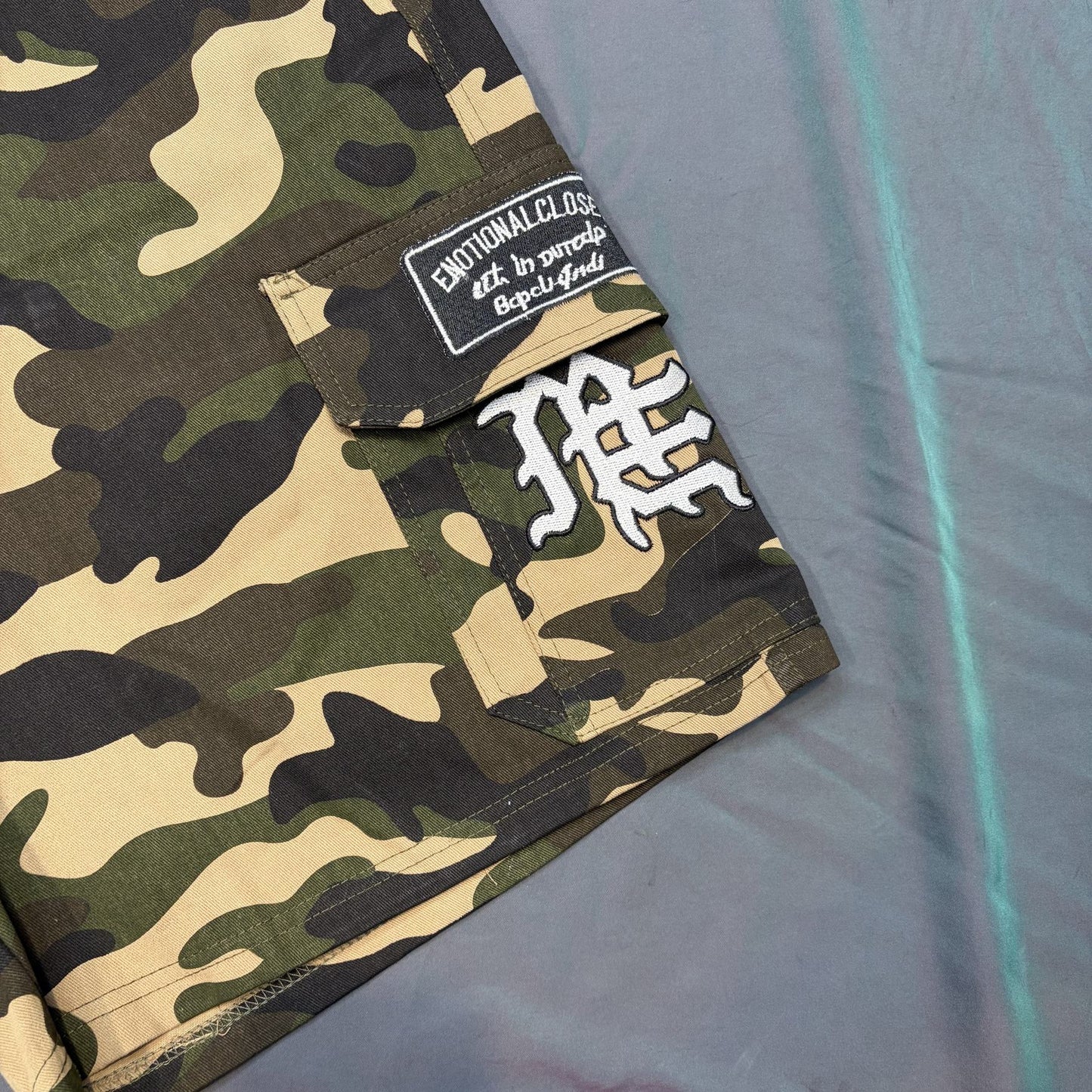 MIXED EMOTION Green Camouflage Embroidered Cargo Shorts — detail