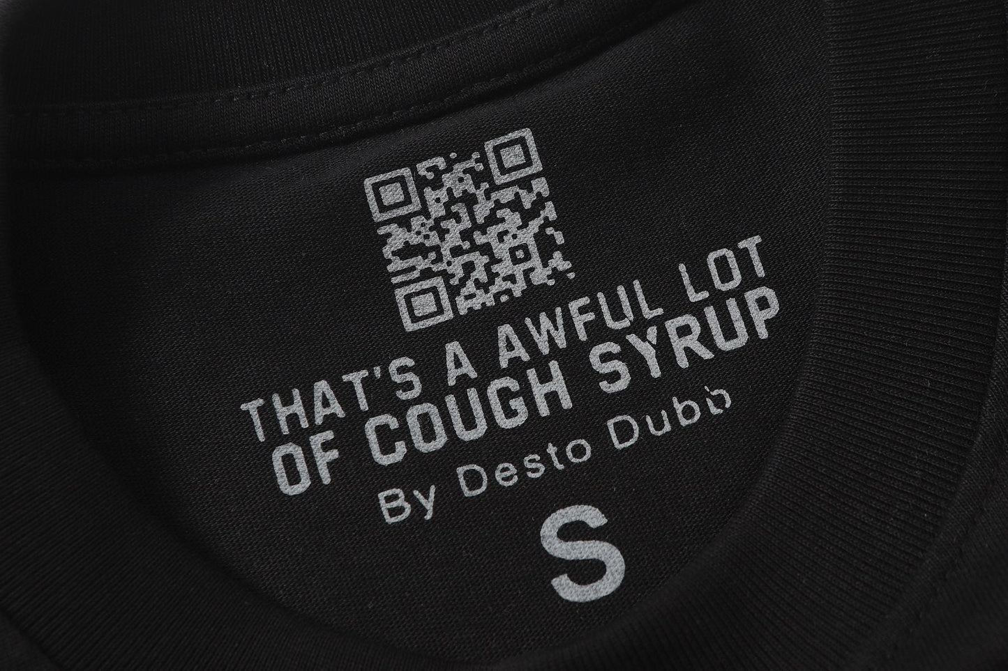 THAT'S A AWFUL LOT OF COUGH SYRUP Eiffel Tower Graphic T-Shirt — neck_label