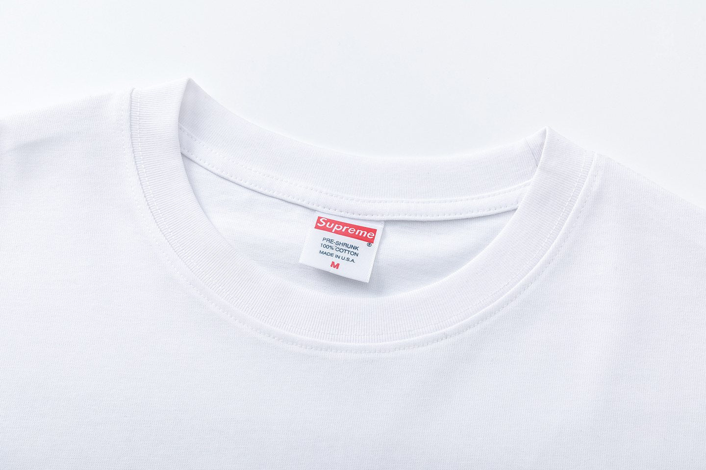 Supreme World Famous Short-Sleeve Graphic T-Shirt — neck_label