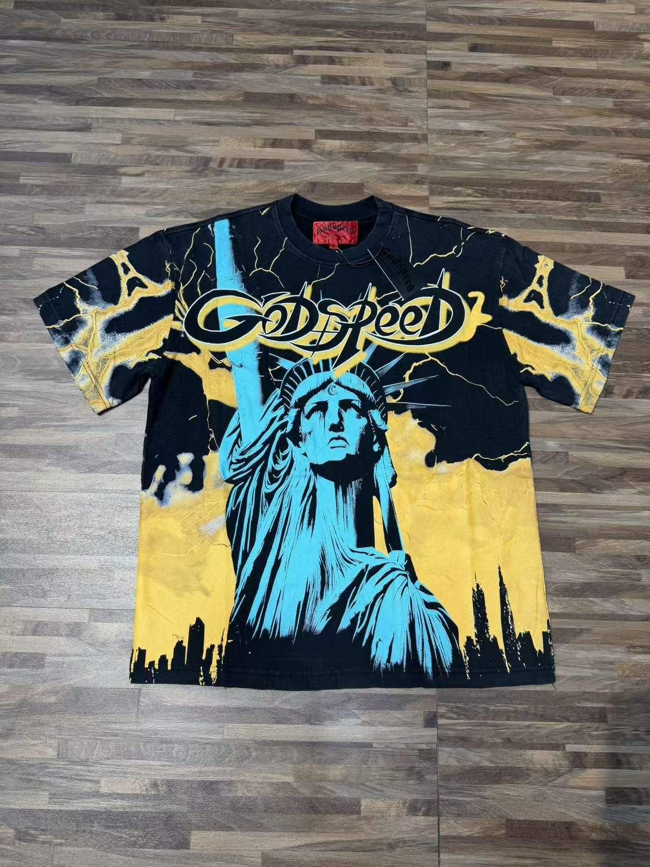 Godspeed Out of Many One Statue Graphic T-Shirt — front