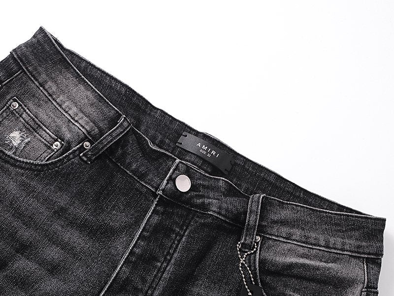 AMIRI Washed Black Embroidered Denim Shorts — detail