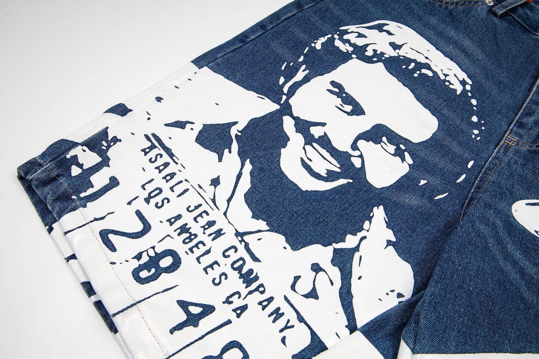 ASAALL Portrait Graphic Washed Denim Shorts — detail