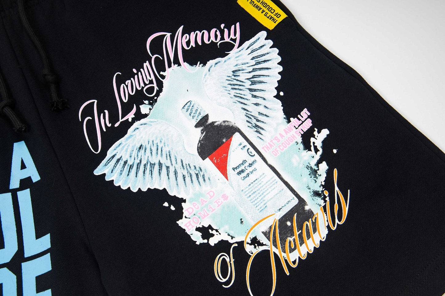 THAT'S A AWFUL LOT OF COUGH SYRUP Black Graphic Shorts — detail