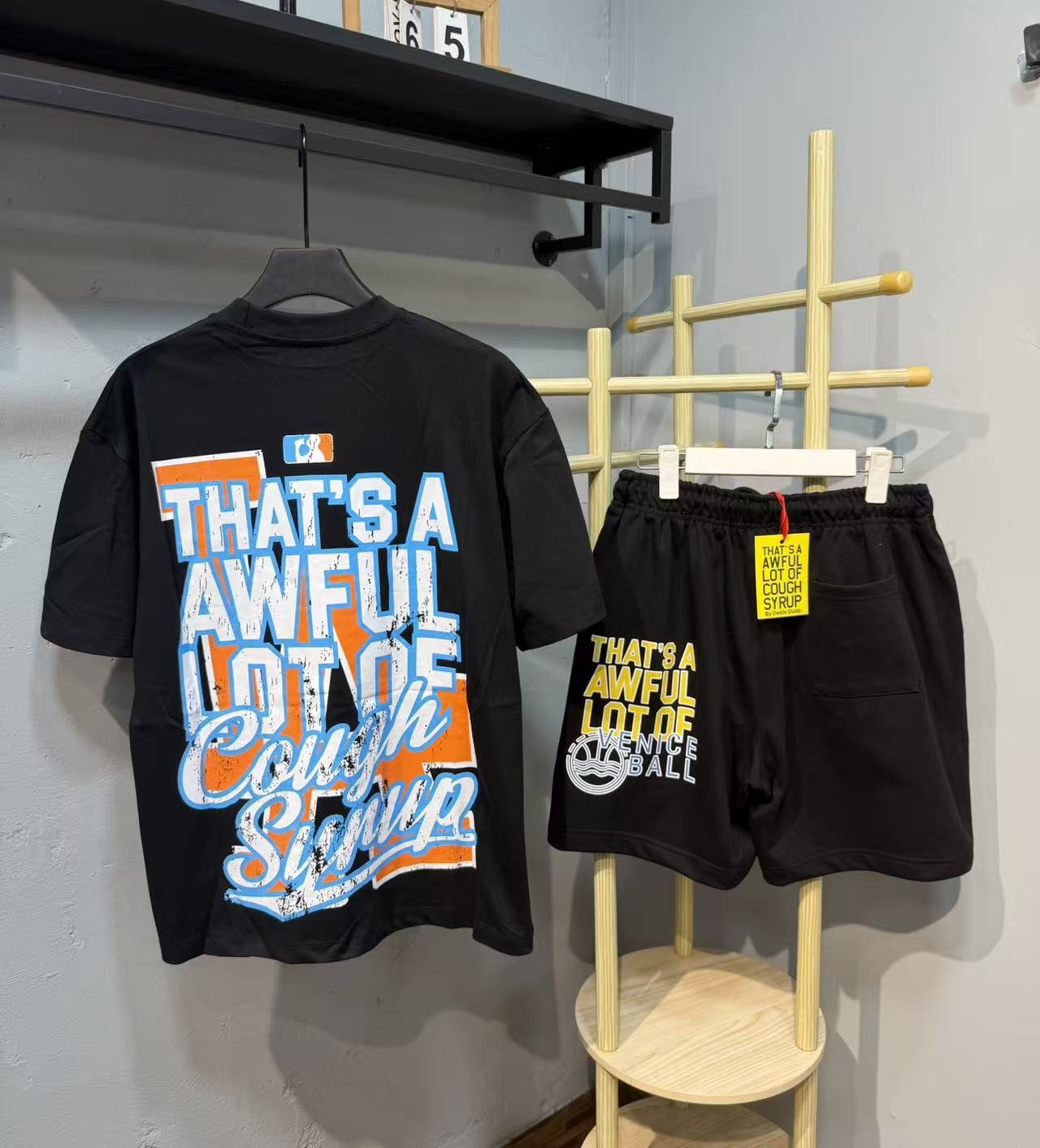 THAT'S A AWFUL LOT OF COUGH SYRUP LA Graphic Short-Sleeve Set — context