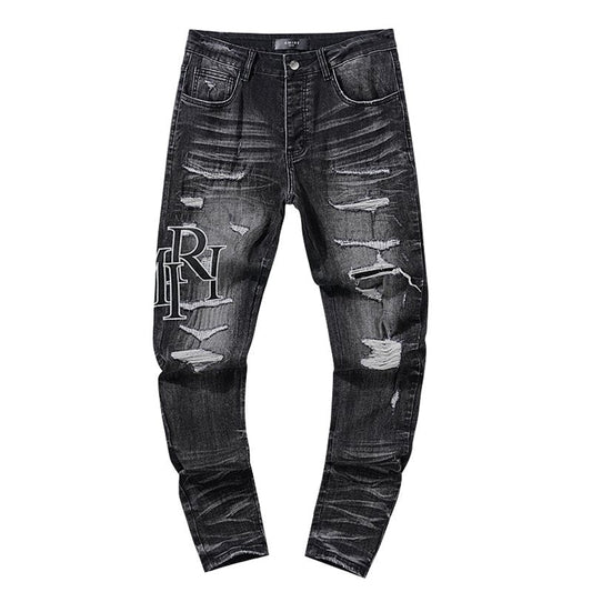 AMIRI Black Distressed Letter Graphic Jeans — hero