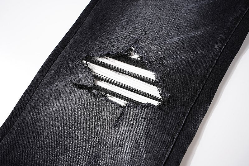 AMIRI Black Washed Distressed Jeans — detail