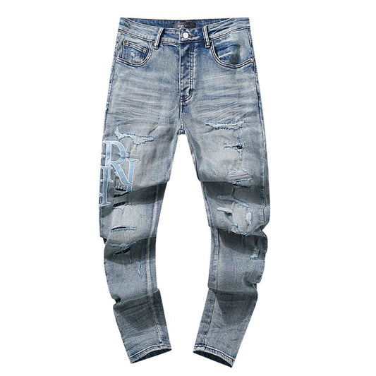 AMIRI Light Blue Letter Graphic Distressed Jeans — hero