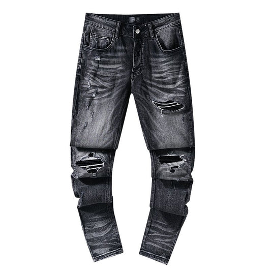 AMIRI Washed Black Distressed Jeans — hero