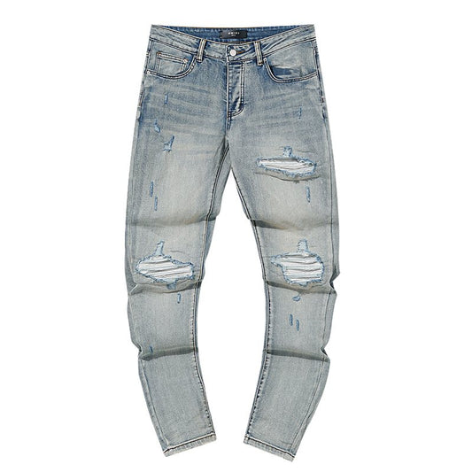 AMIRI Light Blue Distressed Ripped Knee Jeans — hero