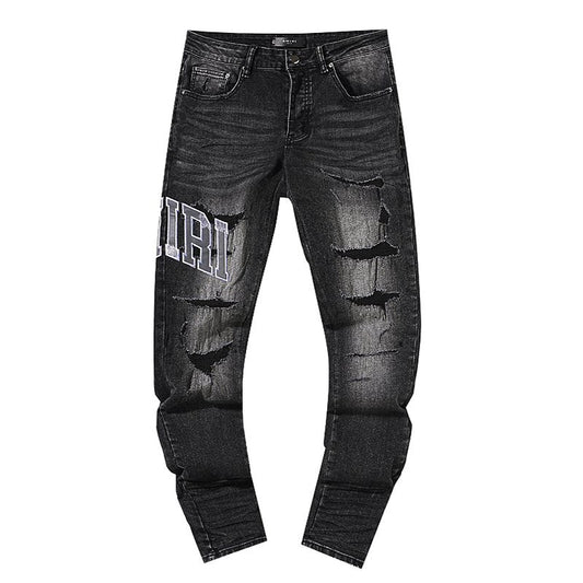 AMIRI Distressed Washed Black Graphic Jeans — hero