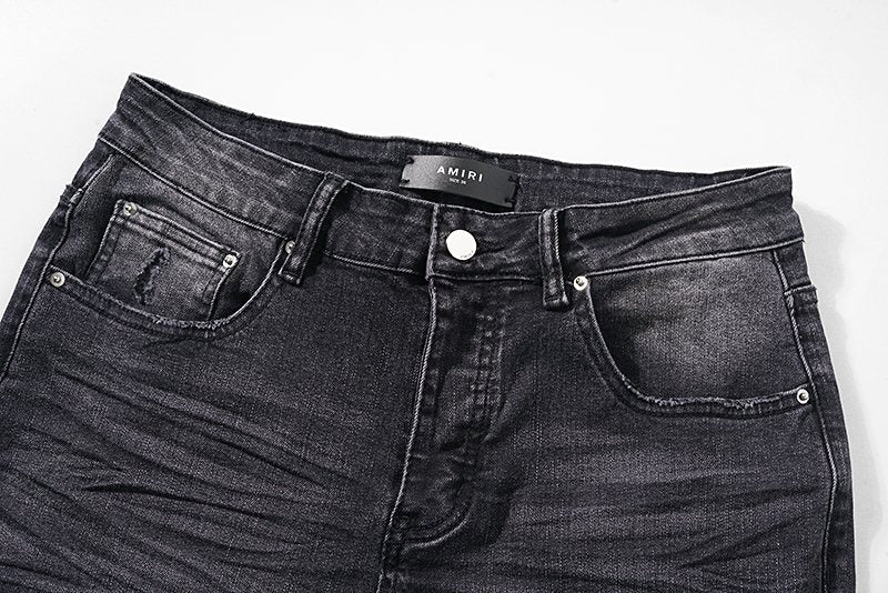 AMIRI Distressed Washed Black Graphic Jeans — detail