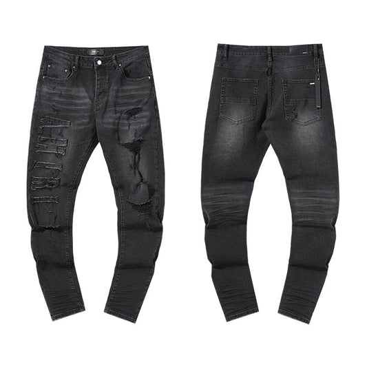AMIRI Distressed Black Washed Jeans — hero