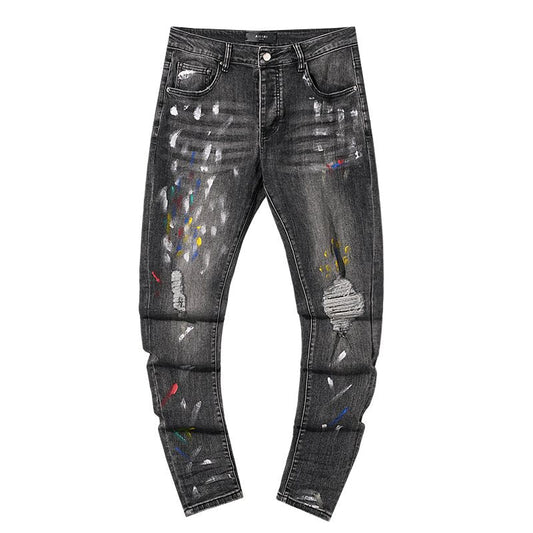 AMIRI Paint-Splatter Distressed Jeans — hero