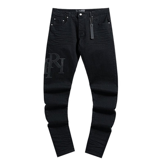 AMIRI Tonal Letter Graphic Black Jeans — hero