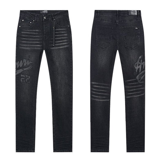 AMIRI Black Washed Graphic Jeans — hero