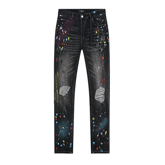 AMIRI Paint Splatter Distressed Black Jeans — hero