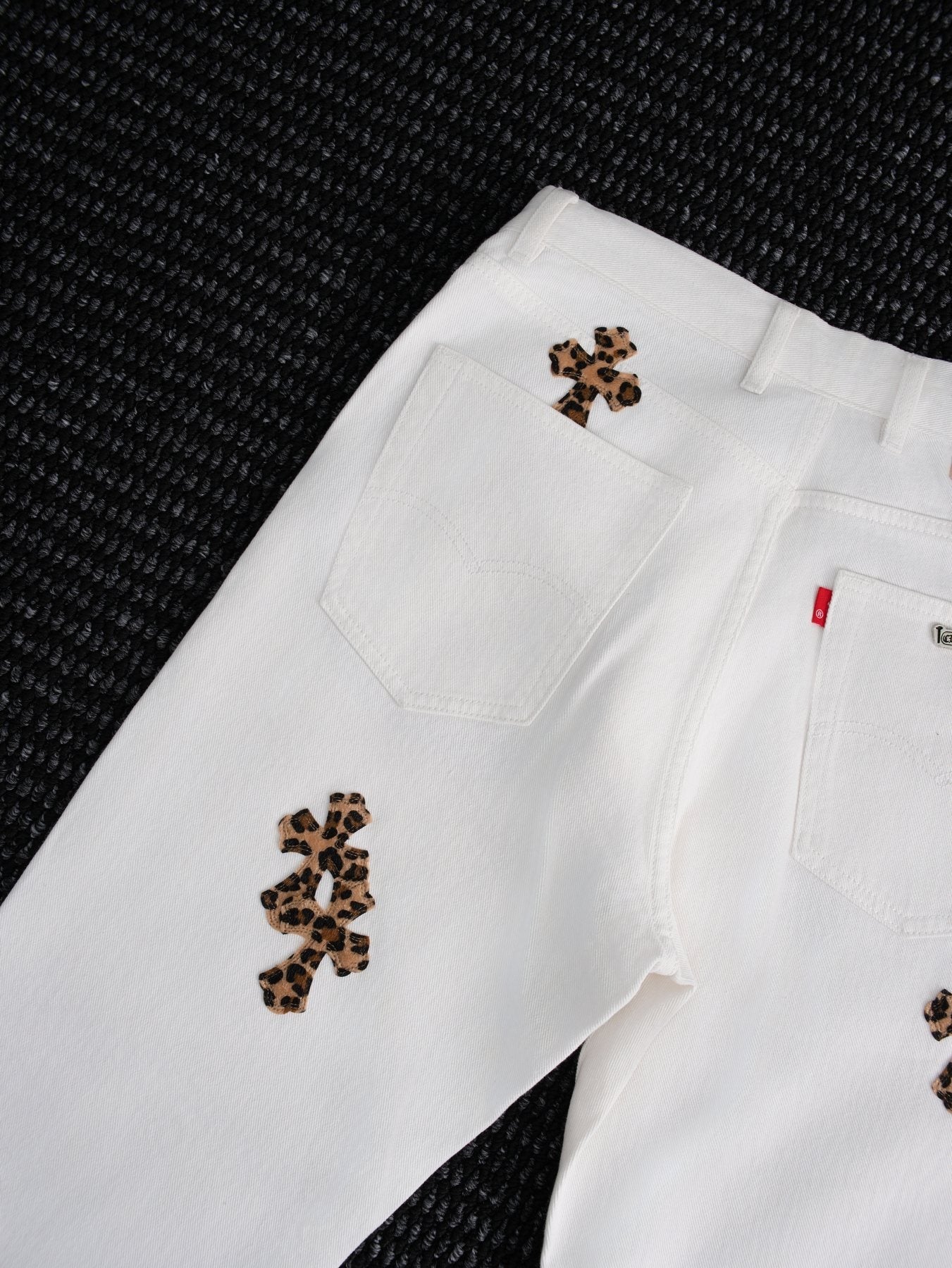 Chrome Hearts White Cross Applique Graphic Jeans — detail