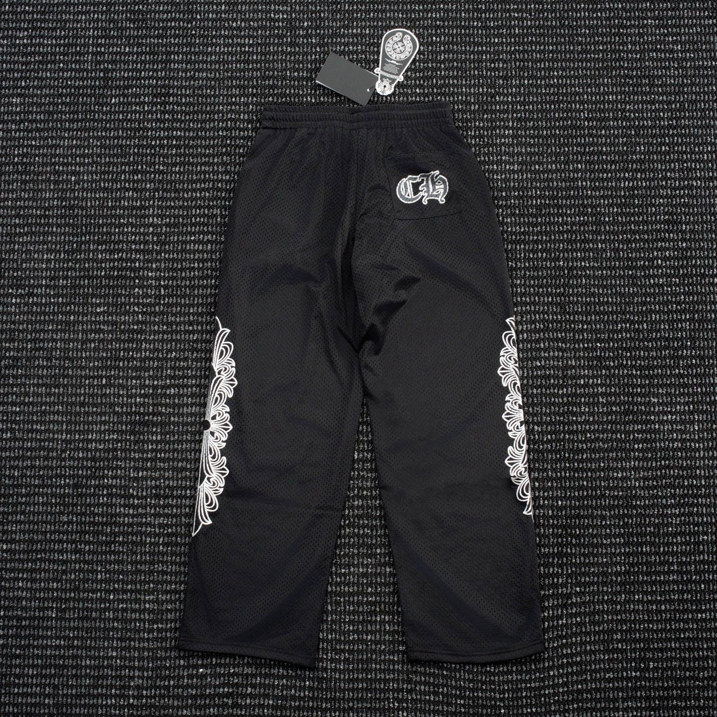 Chrome Hearts Sanskrit Cross Graphic Wide-Leg Pants — hero