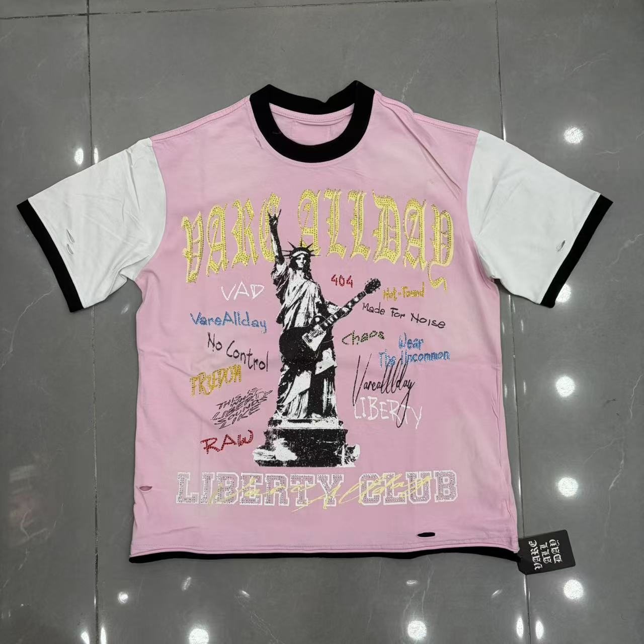 VARE ALL DAY Pink Contrast-Sleeve Graphic T-Shirt — hero