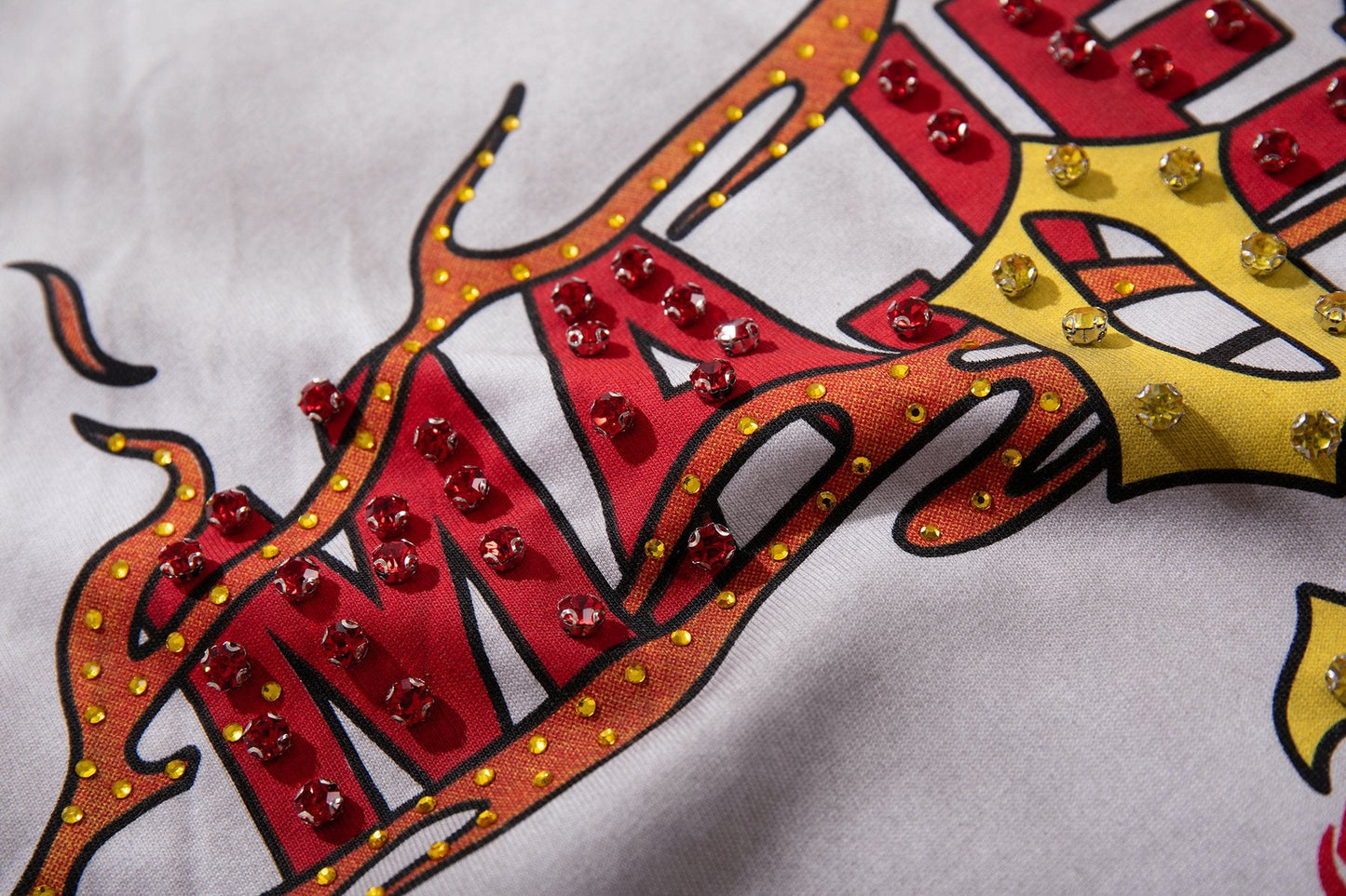MAJESTIK Studded Washed Graphic Sleeveless T-Shirt — detail