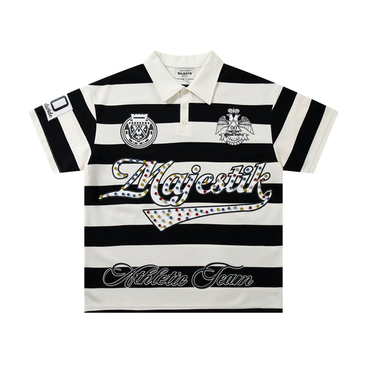 MAJESTIK Striped Crest Graphic Polo Shirt — hero